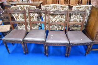 A set of four Victorian mahogany dining chairs