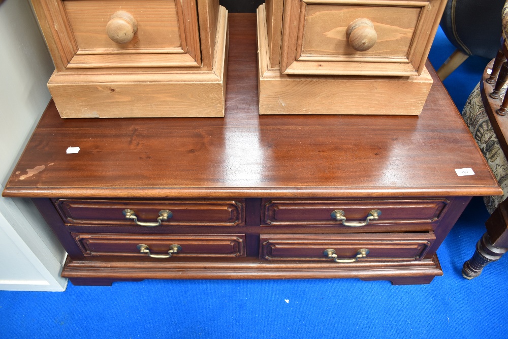 A modern hardwood coffee table with drawers