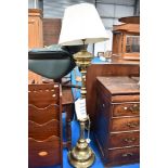 A Victorian brass standard lamp, converted from oil to electric