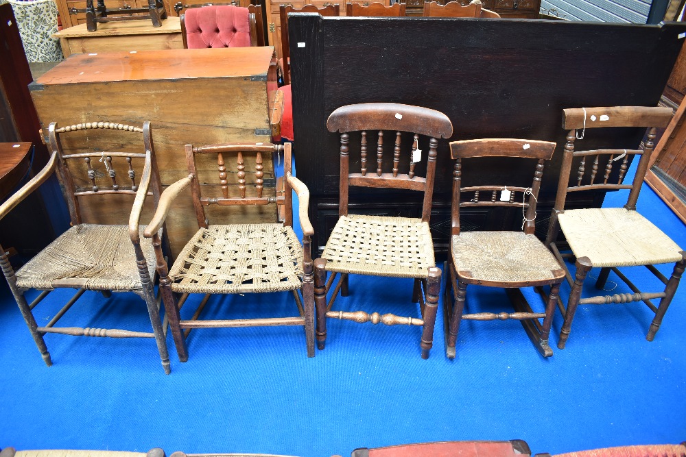 A selection of 19th Century country style spindle back chairs, various designs, including local