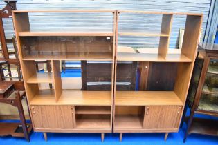 Two 1980s teak effect laminate room divider shelving units