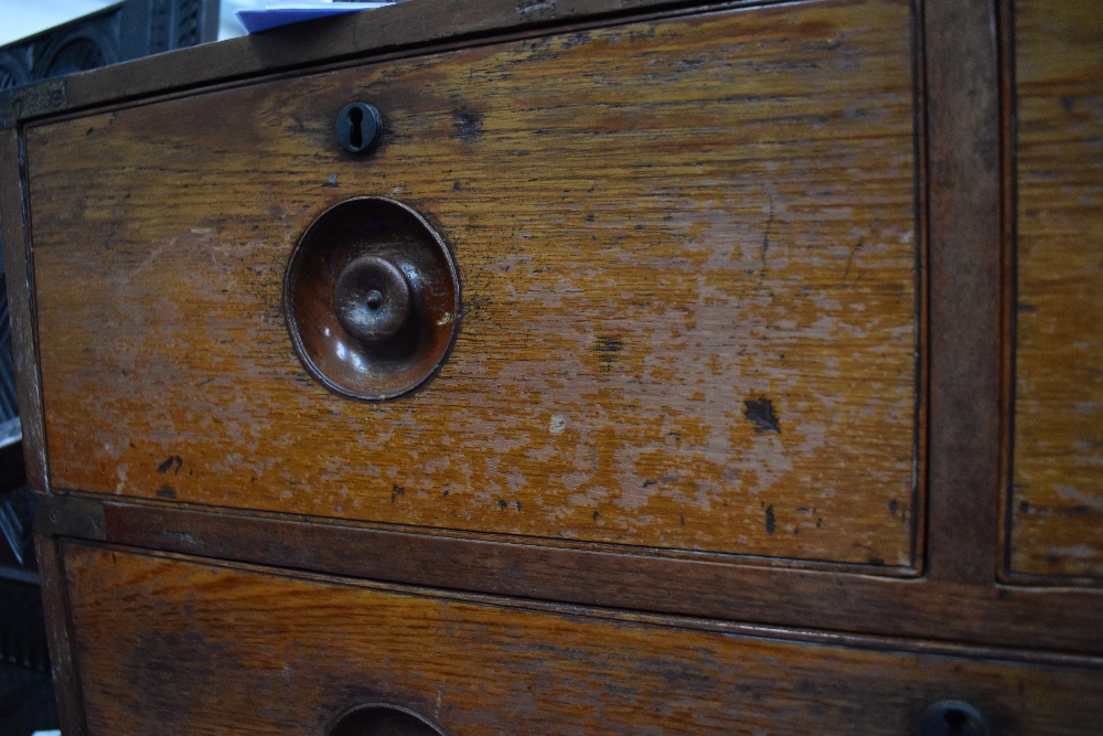 A 19th Century campaign chest of two over three drawers having recessed handles - Image 4 of 8