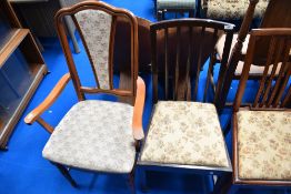 A set of three early 20th Century mahogany dining chairs , plus one similar and a later carver