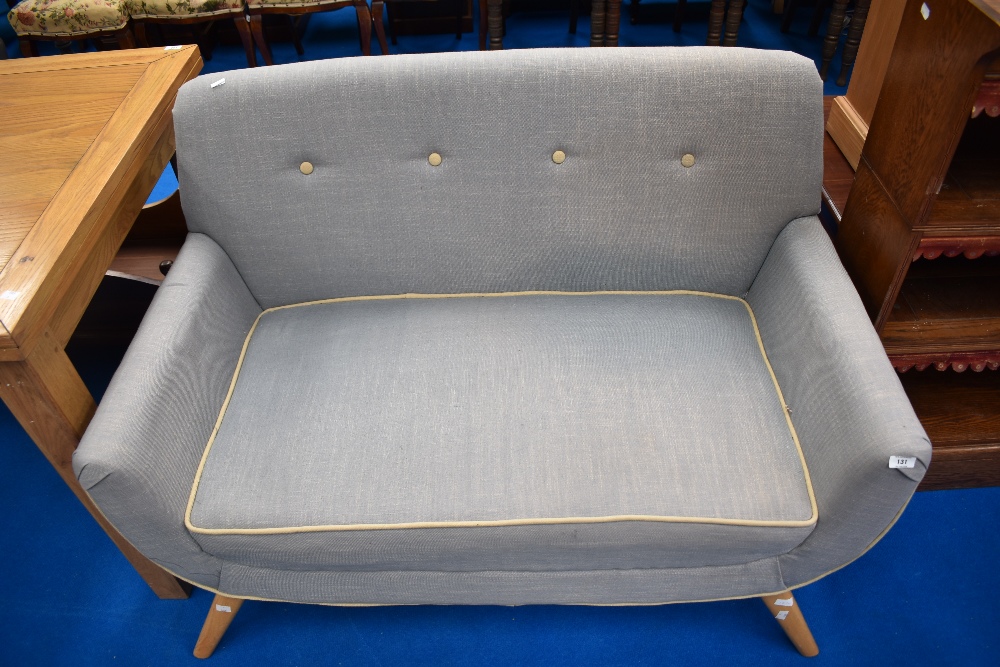 A modern vintage style settee of nice proportions on stylised frame similar to Ercol (Dunelm)