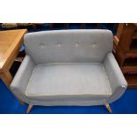 A modern vintage style settee of nice proportions on stylised frame similar to Ercol (Dunelm)