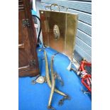 A pair of vintage brass horse hames and an Art Nouveau style brass and copper fire screen