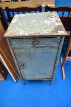 A vintage metal side cabinet