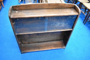 An early to mid 20th Century oak low bookcase