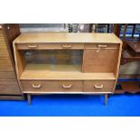 An mid 20th Century golden oak Gomme (G plan) lounge sideboard/cocktail or display