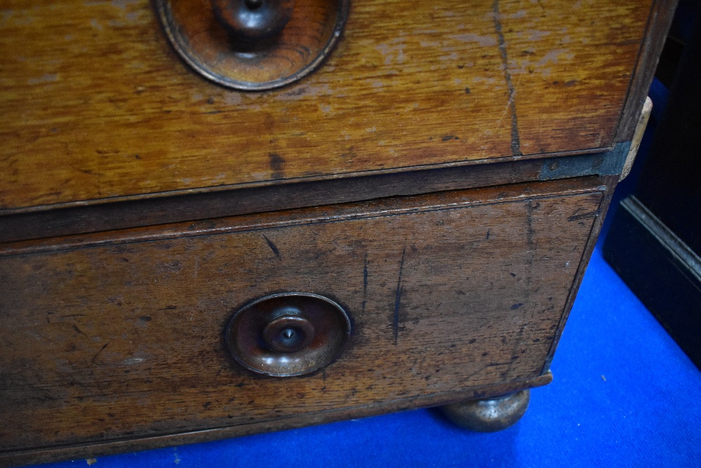 A 19th Century campaign chest of two over three drawers having recessed handles - Image 5 of 8