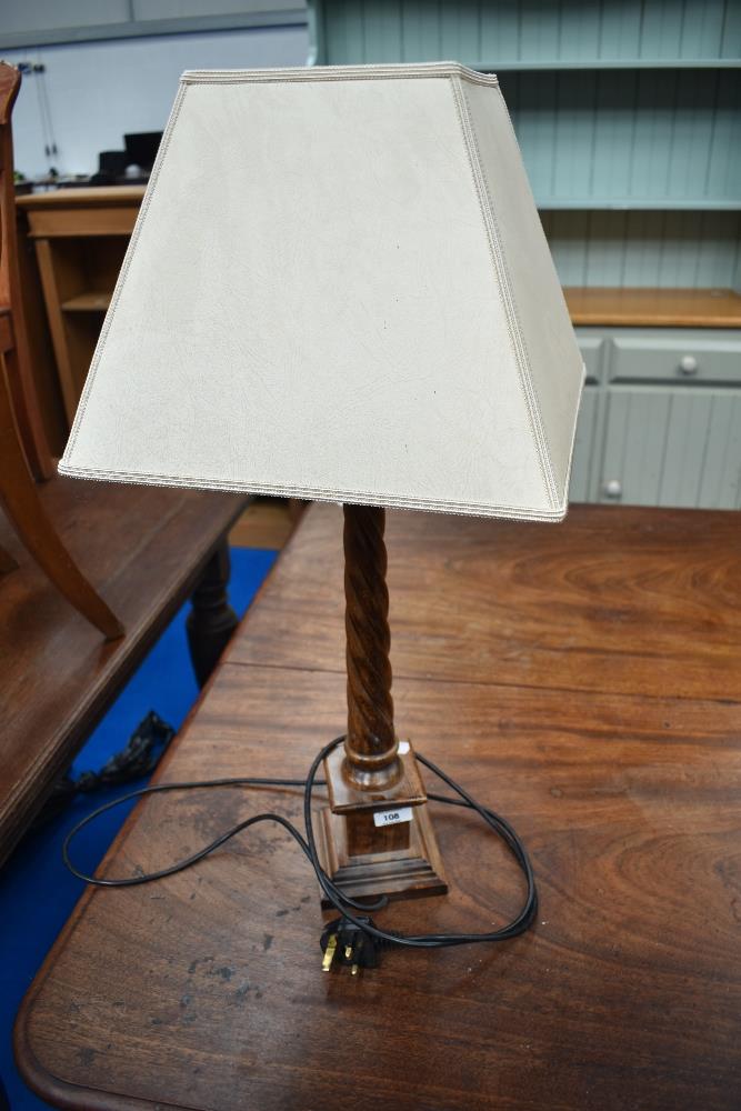 A modern wood table lamp