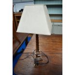 A modern wood table lamp