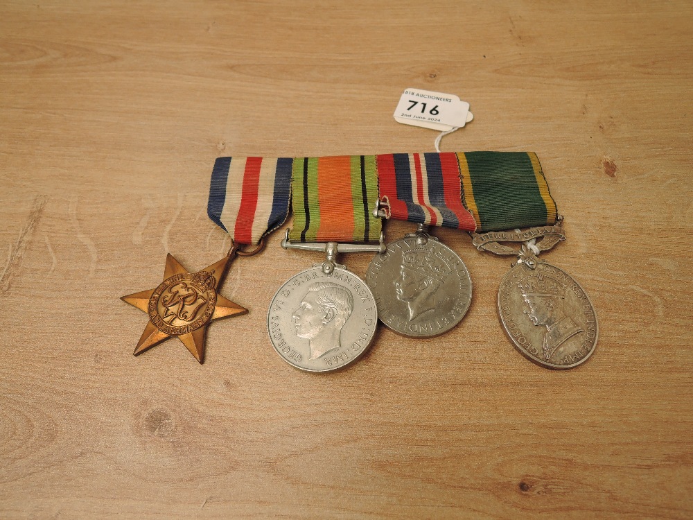 A group of Four WWII Medals to 4195136 PTE.J.H.ROBERTS.R.P.C, France & Germany Star, Defence