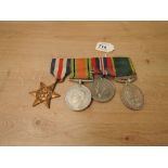 A group of Four WWII Medals to 4195136 PTE.J.H.ROBERTS.R.P.C, France & Germany Star, Defence