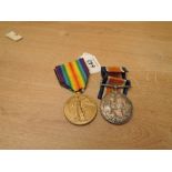 A WWI Medal Pair, War & Victory Medals to 1803 PTE.W.E.S.SHAW.DENBRGH.YOU, both with ribbons,