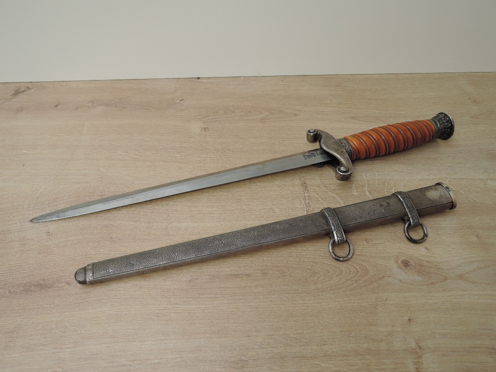 A WWII German Army Officers Dagger with scabbard, makers mark Original Eickhorn Solingen, blade