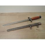 A WWII German Army Officers Dagger with scabbard, makers mark Original Eickhorn Solingen, blade