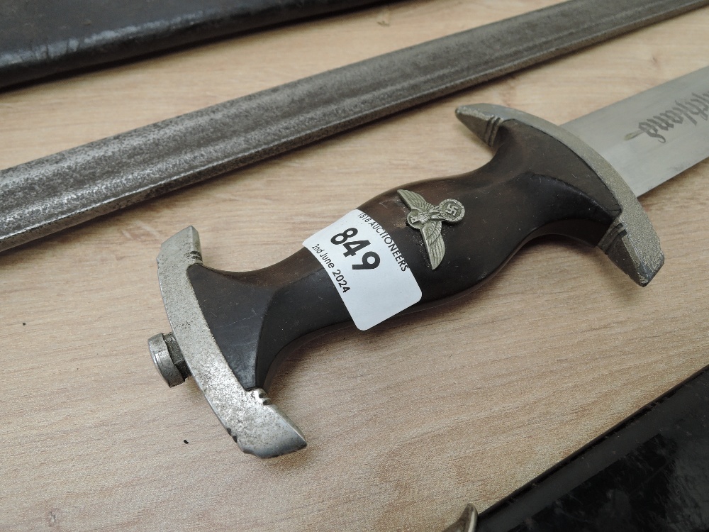 A reproduction German Dagger along with an unknown Sword in af condition, two leather scabbards - Image 5 of 7