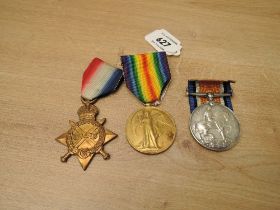 A WWI Medal Trio, 1914-15 Star, War Medal & Victory Medal to 19304 PTE.T.DUNBAVIN.LAN.FUS, all