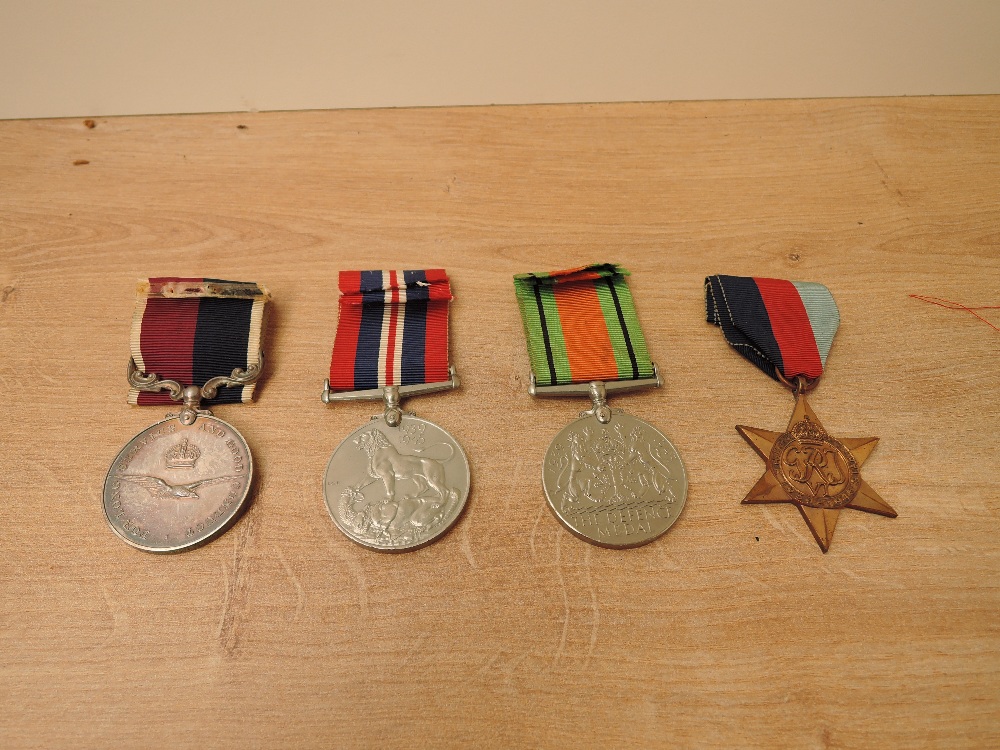 A WWII Four Medal Group to FLT.LT.B.E.LAKE.RAF, 1939-45 Star, Defence Medal, War Medal and named