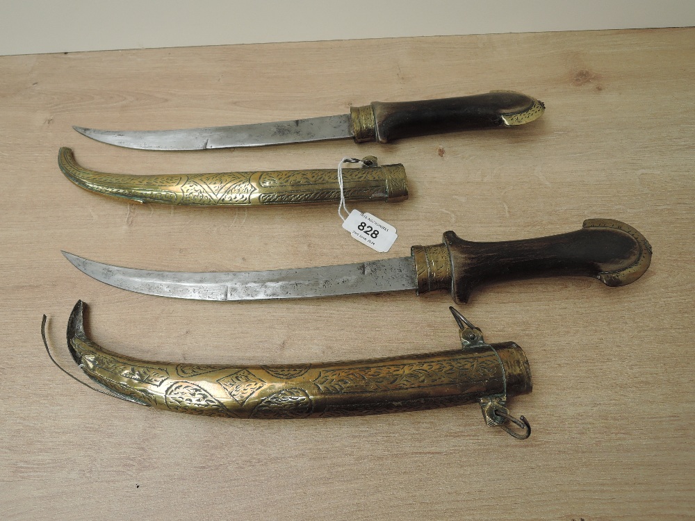 A pair of Turkish/Persian Khanjar Daggers with wood & brass hilts, decorated brass scabbards, 22cm