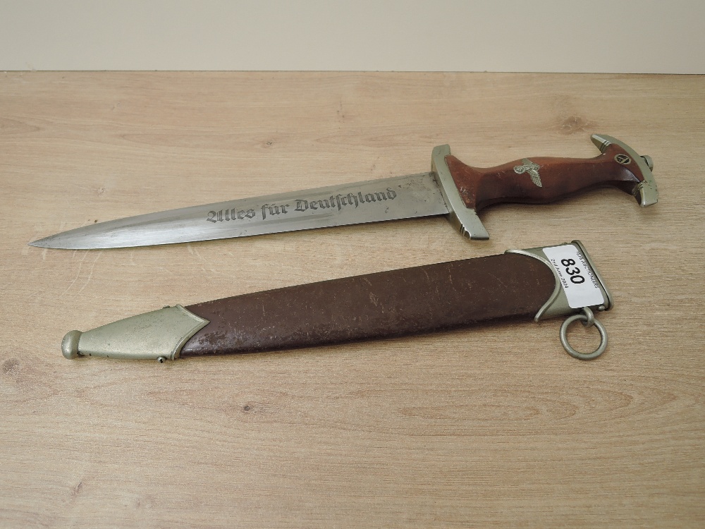 A WWII German SA Service Dagger with scabbard, makers mark Herm Linder Sohne Solingen, blade