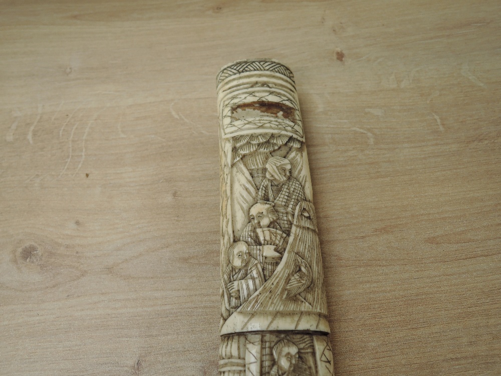 A Japanese Dagger with highly carved bone hilt and scabbard depicting Village People & Houses, blade - Image 5 of 8