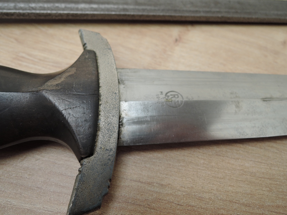 A reproduction German Dagger along with an unknown Sword in af condition, two leather scabbards - Image 3 of 7