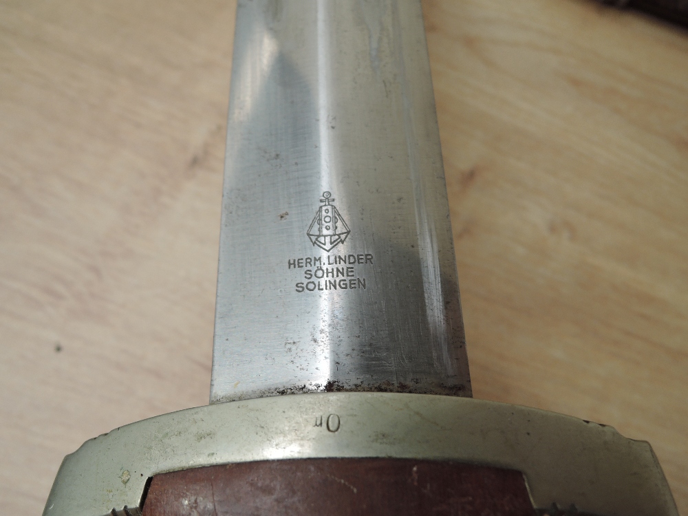 A WWII German SA Service Dagger with scabbard, makers mark Herm Linder Sohne Solingen, blade - Image 3 of 5