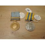 A British Korea Medal to 22384293 PTE.B.MURPHY.B.W and British UN Medal unnamed as issued