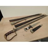 A reproduction German Dagger along with an unknown Sword in af condition, two leather scabbards