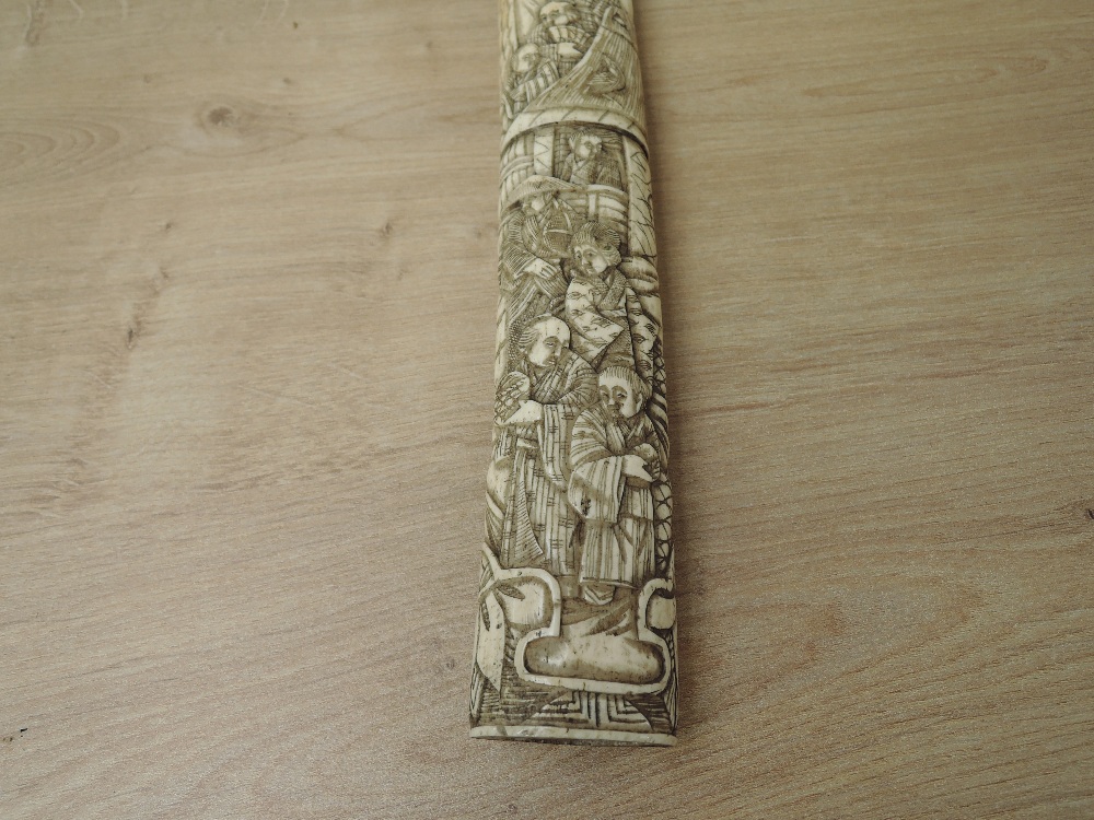 A Japanese Dagger with highly carved bone hilt and scabbard depicting Village People & Houses, blade - Image 6 of 8