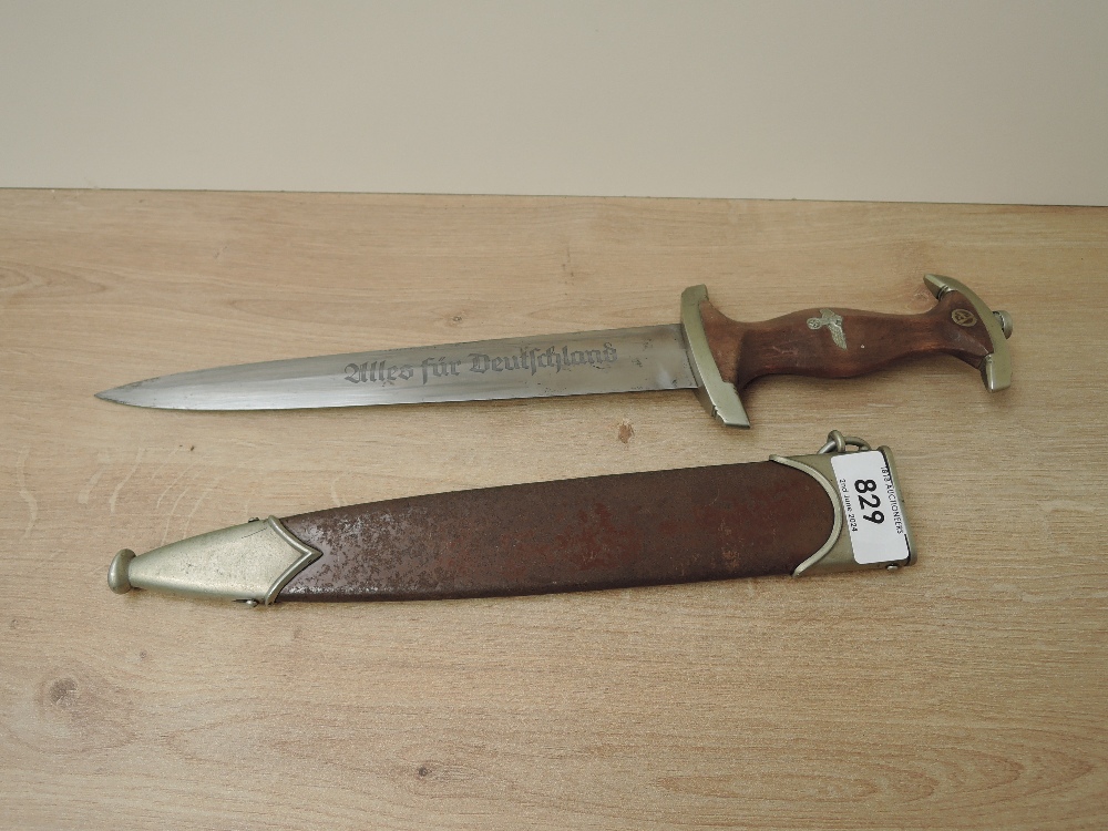 A WWII German SA Service Dagger with scabbard, makers mark F.Dick Esslingen, blade length 22cm,