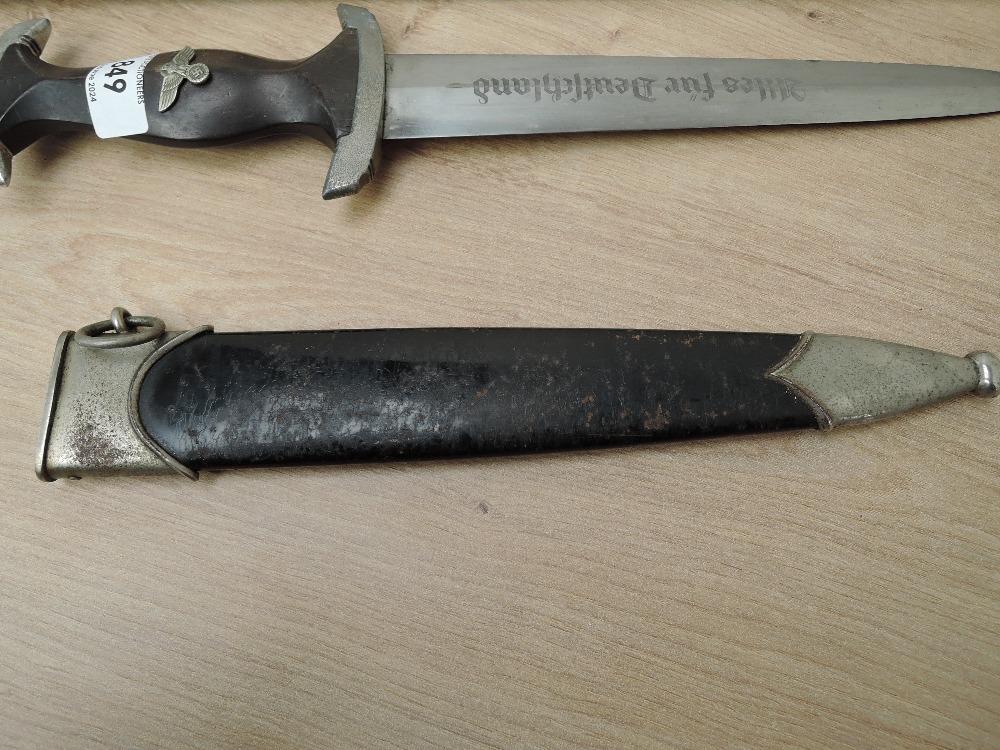 A reproduction German Dagger along with an unknown Sword in af condition, two leather scabbards - Image 7 of 7