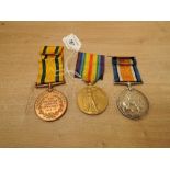 A WWI Territorial Force War Medal to 1412 PTE.J.JOHNSON.R.A.M.C and War & Victory Medals to 1412 A.