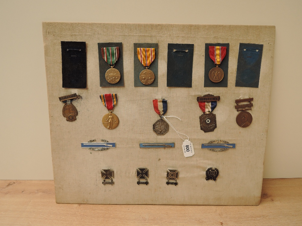 A collection of US Medals and Badges, WWII European African Middle Eastern Campaign Medal, WWII