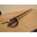 A British Infantry Officer's Sword 1895 Pattern with brown leather scabbard, decorated blade,