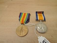 A WWI Medal Pair, War & Victory Medals to 41292 CPL.S.P.MILNER.MANCH.R, both with ribbons