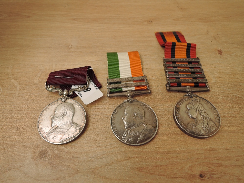 A Trio of Medals, pair of Queen and King South Africa Medals along with King Edward VII Long Service
