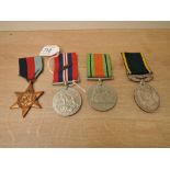 A group of Four WWII Medals to 394047.PTE.J.C.HANAGHAN.4-5.CHES.R, 1939-45 Star, Defence Medal,