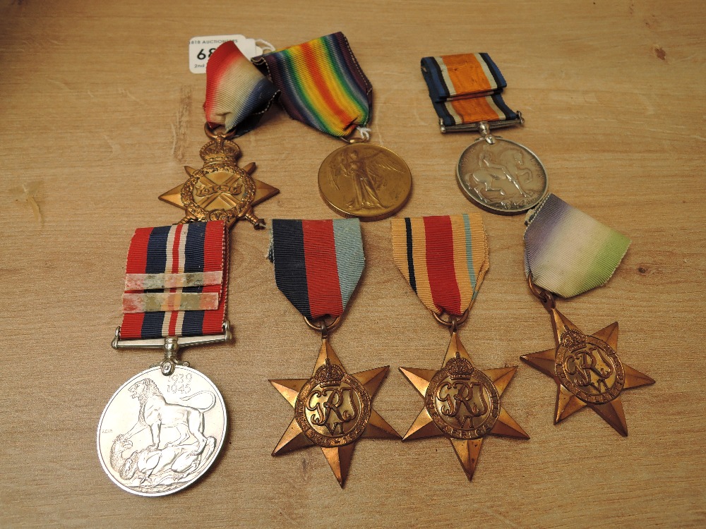 A WWI and WWII Medal Group, WWI Trio 1914-15 Star, War & Victory Medals to J.WATKINS.ASST.STD.M.F.