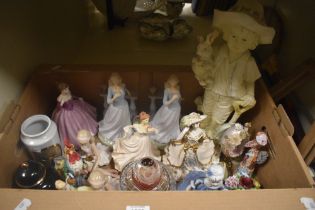 A carton of assorted figurines including a Coalport 'Heart to Heart' lady, a crystal rose bowl and