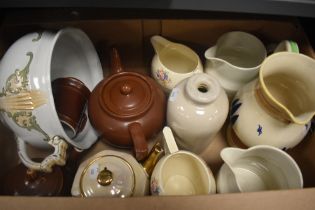 a selection of assorted jugs and teapots including Royal Doulton, Wedgwood & Co Ltd and Langley Ware