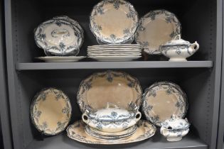 A WAA & Co. Louis XVI part dinner service in blue and cream (25 pieces approx).