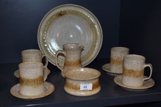 An attractive Pilling Pottery stoneware part coffee set, with 1970's inspired mottled buff glaze