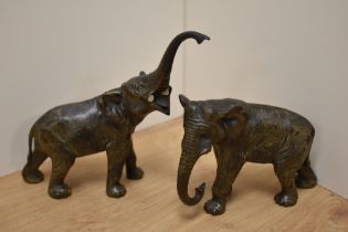 A pair of early 20th century cold painted cast bronze elephants.