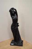 An Art Nouveau style cast-resin depiction of a semi nude maiden with arms held aloft AF damage to