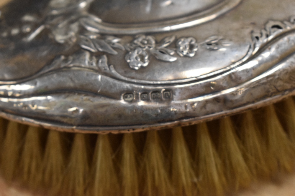 An Edwardian silver mounted hair brush, of traditional design, some denting to body - Image 2 of 2
