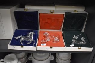 Three Swarovski crystal studies, to include unicorn, Pegasus and Chinese dragon, all boxed. Af.