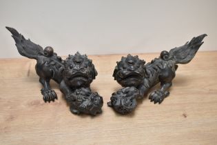 A pair of fine and attractive Chinese cast-bronze Kylin, Temple lions, Foo dogs or shi shi, one